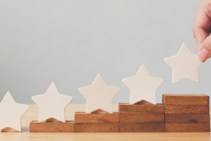 rh-psi-nota5 um pódio com 5 estrelas para simbolizar a nota do nosso curso de RH.